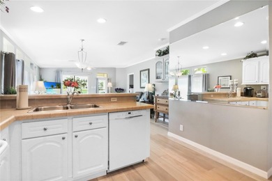 2005 Palm Harbor built home with an oversize one car garage and on Maple Leaf Golf and Country Club in Florida - for sale on GolfHomes.com, golf home, golf lot