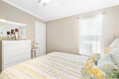 2005 Palm Harbor built home with an oversize one car garage and on Maple Leaf Golf and Country Club in Florida - for sale on GolfHomes.com, golf home, golf lot