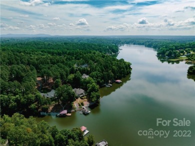 Wow, what a fabulous setting!  This lakefront lot is located on on Granada Farms Country Club in North Carolina - for sale on GolfHomes.com, golf home, golf lot