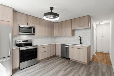 This beautifully updated home in the highly sought-after Waite on Columbia Golf Club in Minnesota - for sale on GolfHomes.com, golf home, golf lot