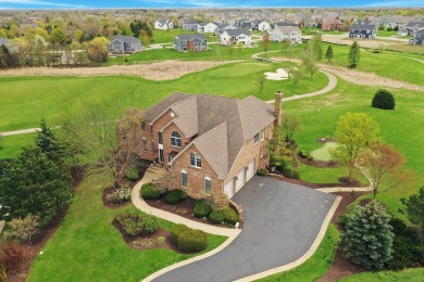 Prepare to be captivated by this remarkable brick Colonial home on Hawthorn Woods Country Club in Illinois - for sale on GolfHomes.com, golf home, golf lot