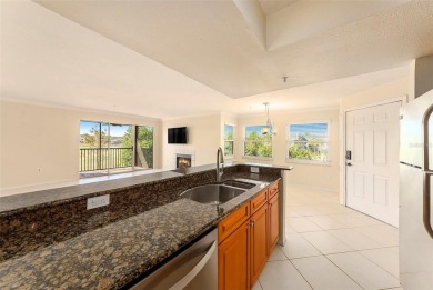 Welcome to this beautiful 2nd floor end unit condo at Audubon in on Feather Sound Country Club in Florida - for sale on GolfHomes.com, golf home, golf lot