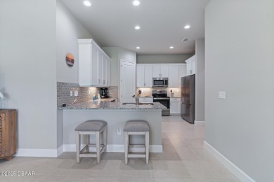 Welcome to your MAINTENANCE-FREE Townhome in the incredible on Plantation Bay Golf and Country Club in Florida - for sale on GolfHomes.com, golf home, golf lot