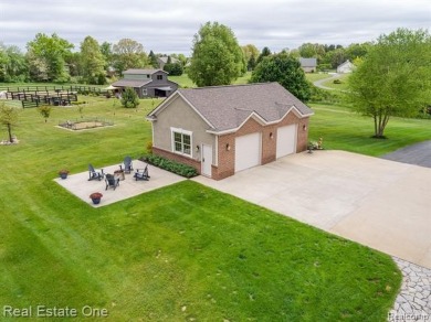 Nestled at end of a cul-de-sac this Spectacular-Built Home is on Prestwick Village Golf Club in Michigan - for sale on GolfHomes.com, golf home, golf lot