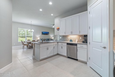 Welcome to your MAINTENANCE-FREE Townhome in the incredible on Plantation Bay Golf and Country Club in Florida - for sale on GolfHomes.com, golf home, golf lot