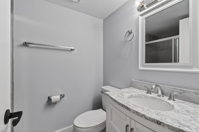 First-floor, fully updated condo with beautiful views and true on The Golf Club of Jupiter in Florida - for sale on GolfHomes.com, golf home, golf lot