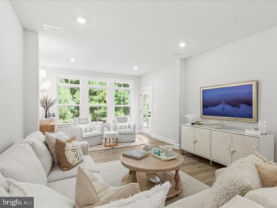 Welcome to 22179 Dune Circle, a stunning end-unit townhome in on The Peninsula Golf and Country Club in Delaware - for sale on GolfHomes.com, golf home, golf lot
