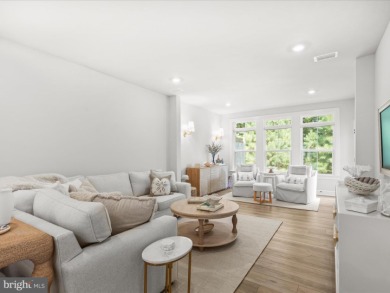 Welcome to 22179 Dune Circle, a stunning end-unit townhome in on The Peninsula Golf and Country Club in Delaware - for sale on GolfHomes.com, golf home, golf lot