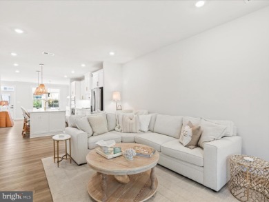 Welcome to 22179 Dune Circle, a stunning end-unit townhome in on The Peninsula Golf and Country Club in Delaware - for sale on GolfHomes.com, golf home, golf lot