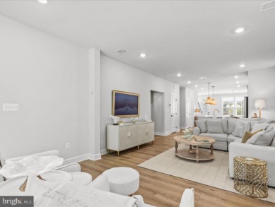 Welcome to 22179 Dune Circle, a stunning end-unit townhome in on The Peninsula Golf and Country Club in Delaware - for sale on GolfHomes.com, golf home, golf lot