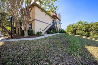 Welcome to this beautiful 2nd floor end unit condo at Audubon in on Feather Sound Country Club in Florida - for sale on GolfHomes.com, golf home, golf lot