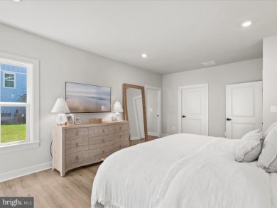 Welcome to 22179 Dune Circle, a stunning end-unit townhome in on The Peninsula Golf and Country Club in Delaware - for sale on GolfHomes.com, golf home, golf lot