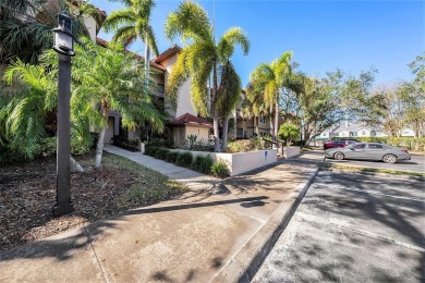 Welcome to this beautiful 2nd floor end unit condo at Audubon in on Feather Sound Country Club in Florida - for sale on GolfHomes.com, golf home, golf lot