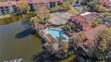 Welcome to this beautiful 2nd floor end unit condo at Audubon in on Feather Sound Country Club in Florida - for sale on GolfHomes.com, golf home, golf lot