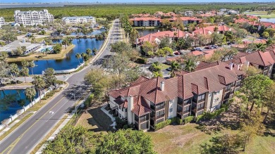 Welcome to this beautiful 2nd floor end unit condo at Audubon in on Feather Sound Country Club in Florida - for sale on GolfHomes.com, golf home, golf lot