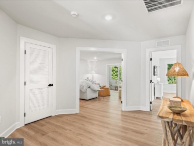 Welcome to 22179 Dune Circle, a stunning end-unit townhome in on The Peninsula Golf and Country Club in Delaware - for sale on GolfHomes.com, golf home, golf lot