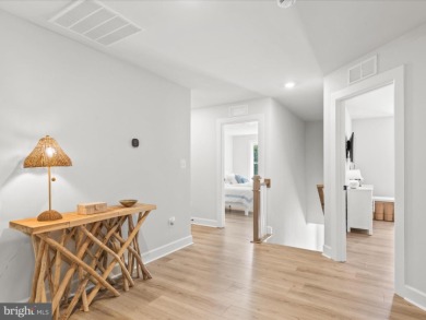 Welcome to 22179 Dune Circle, a stunning end-unit townhome in on The Peninsula Golf and Country Club in Delaware - for sale on GolfHomes.com, golf home, golf lot