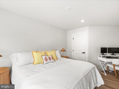 Welcome to 22179 Dune Circle, a stunning end-unit townhome in on The Peninsula Golf and Country Club in Delaware - for sale on GolfHomes.com, golf home, golf lot