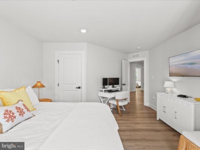 Welcome to 22179 Dune Circle, a stunning end-unit townhome in on The Peninsula Golf and Country Club in Delaware - for sale on GolfHomes.com, golf home, golf lot