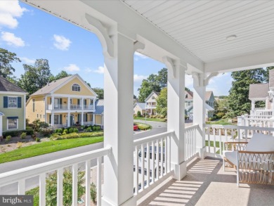 Welcome to 22179 Dune Circle, a stunning end-unit townhome in on The Peninsula Golf and Country Club in Delaware - for sale on GolfHomes.com, golf home, golf lot