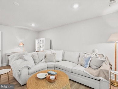 Welcome to 22179 Dune Circle, a stunning end-unit townhome in on The Peninsula Golf and Country Club in Delaware - for sale on GolfHomes.com, golf home, golf lot