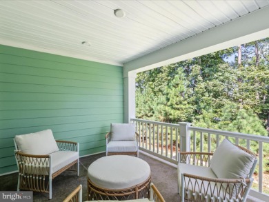 Welcome to 22179 Dune Circle, a stunning end-unit townhome in on The Peninsula Golf and Country Club in Delaware - for sale on GolfHomes.com, golf home, golf lot