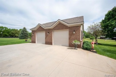 Nestled at end of a cul-de-sac this Spectacular-Built Home is on Prestwick Village Golf Club in Michigan - for sale on GolfHomes.com, golf home, golf lot