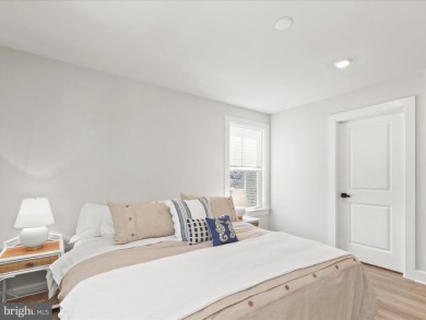 Welcome to 22179 Dune Circle, a stunning end-unit townhome in on The Peninsula Golf and Country Club in Delaware - for sale on GolfHomes.com, golf home, golf lot