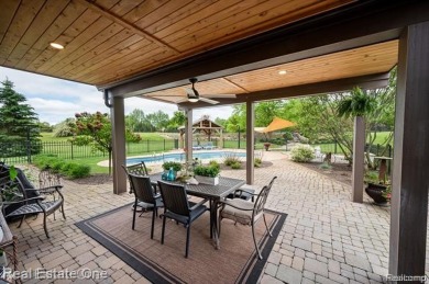 Nestled at end of a cul-de-sac this Spectacular-Built Home is on Prestwick Village Golf Club in Michigan - for sale on GolfHomes.com, golf home, golf lot