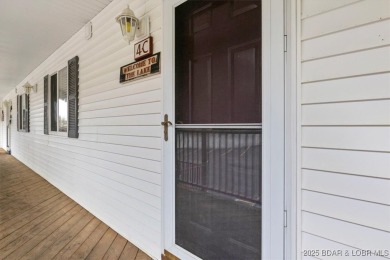 Welcome to this top floor waterfront condo with breathtaking on The Club At Old Kinderhook in Missouri - for sale on GolfHomes.com, golf home, golf lot