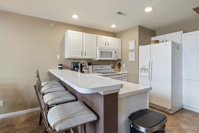 Welcome to this top floor waterfront condo with breathtaking on The Club At Old Kinderhook in Missouri - for sale on GolfHomes.com, golf home, golf lot