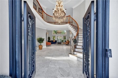 Welcome to your dream home on a quiet cul-de-sac, backing up to on The Golf Club of Georgia in Georgia - for sale on GolfHomes.com, golf home, golf lot