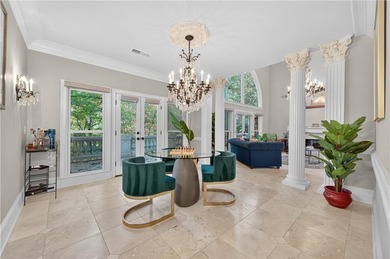 Welcome to your dream home on a quiet cul-de-sac, backing up to on The Golf Club of Georgia in Georgia - for sale on GolfHomes.com, golf home, golf lot