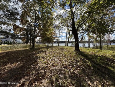 Nestled within the premier gated community of Albemarle on Sound Golf Links at Albemarle Plantation in North Carolina - for sale on GolfHomes.com, golf home, golf lot