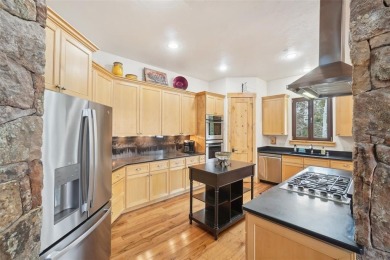 This beautifully crafted single-family home offers the perfect on Raven Golf Club At Three Peaks in Colorado - for sale on GolfHomes.com, golf home, golf lot