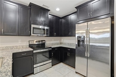 This spacious corner-unit townhome offers 3 bedrooms, 2.5 baths on Gateway Golf and Country Club in Florida - for sale on GolfHomes.com, golf home, golf lot