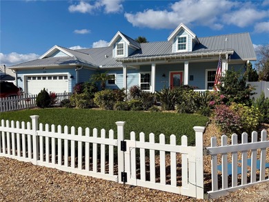 Experience relaxed coastal living in this updated 3-bedroom on Ocean Palm Golf Course in Florida - for sale on GolfHomes.com, golf home, golf lot