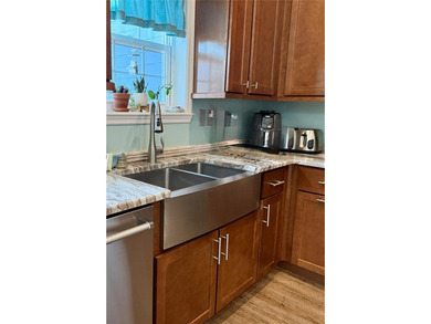 Experience relaxed coastal living in this updated 3-bedroom on Ocean Palm Golf Course in Florida - for sale on GolfHomes.com, golf home, golf lot