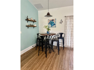 Experience relaxed coastal living in this updated 3-bedroom on Ocean Palm Golf Course in Florida - for sale on GolfHomes.com, golf home, golf lot