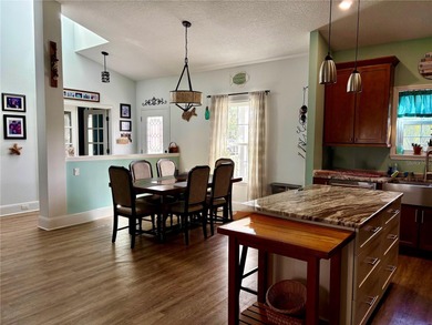 Experience relaxed coastal living in this updated 3-bedroom on Ocean Palm Golf Course in Florida - for sale on GolfHomes.com, golf home, golf lot