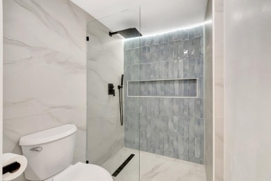 This is a must see!! Completely redone.Gorgeous fully remodeled on The Country Club At Boca Raton in Florida - for sale on GolfHomes.com, golf home, golf lot