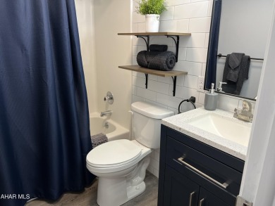 Perfect end unit and successful rental.  Turnkey 1st floor on Blue Knob Rec Area Golf Course in Pennsylvania - for sale on GolfHomes.com, golf home, golf lot