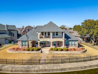 Water's Edge perfection with 132 ft of water frontage on a quiet on Harbor Lakes Golf Club in Texas - for sale on GolfHomes.com, golf home, golf lot