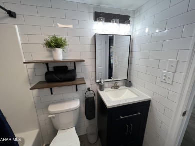 Perfect end unit and successful rental.  Turnkey 1st floor on Blue Knob Rec Area Golf Course in Pennsylvania - for sale on GolfHomes.com, golf home, golf lot