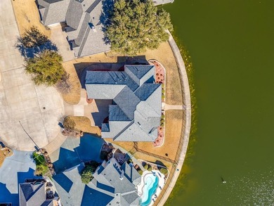 Water's Edge perfection with 132 ft of water frontage on a quiet on Harbor Lakes Golf Club in Texas - for sale on GolfHomes.com, golf home, golf lot