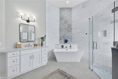 Discover the pinnacle of luxury living in this beautifully on West Bay Beach and Golf Club in Florida - for sale on GolfHomes.com, golf home, golf lot