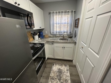 Perfect end unit and successful rental.  Turnkey 1st floor on Blue Knob Rec Area Golf Course in Pennsylvania - for sale on GolfHomes.com, golf home, golf lot
