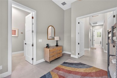 Discover the pinnacle of luxury living in this beautifully on West Bay Beach and Golf Club in Florida - for sale on GolfHomes.com, golf home, golf lot