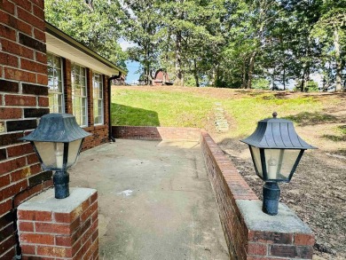 Experience luxury living in this completely remodeled 4-bedroom on Selmer Golf and Country Club in Tennessee - for sale on GolfHomes.com, golf home, golf lot