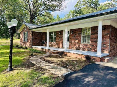 Experience luxury living in this completely remodeled 4-bedroom on Selmer Golf and Country Club in Tennessee - for sale on GolfHomes.com, golf home, golf lot